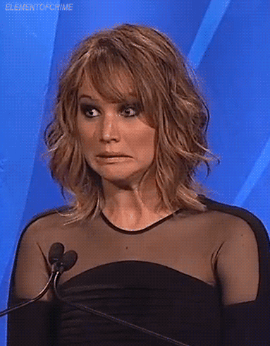 A gif of Jennifer Lawrence looking embarrassed.